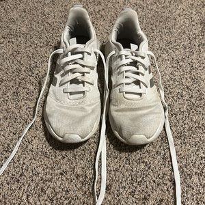 Women’s white adidas sneakers